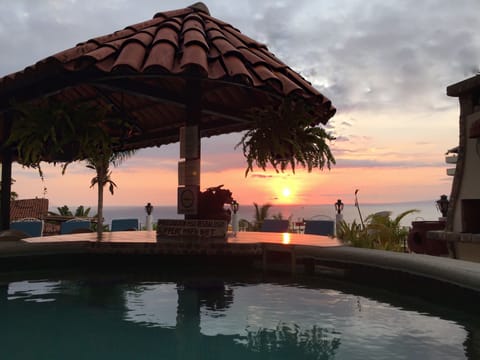 2 outdoor pools, open 9 AM to 11 PM, pool umbrellas, sun loungers