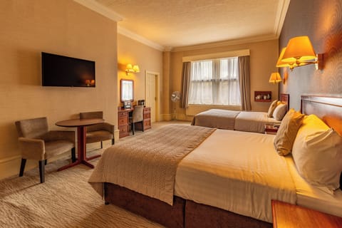 Family Room, 2 Double Beds | Hypo-allergenic bedding, desk, iron/ironing board, free WiFi