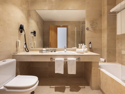 Hair dryer, towels, soap, shampoo