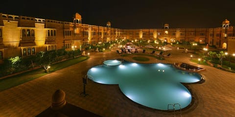 Outdoor pool, pool umbrellas, sun loungers