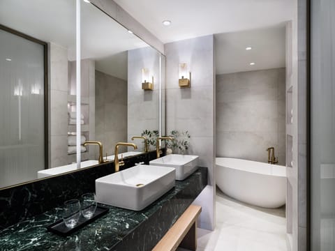 Presidential Suite | Bathroom | Designer toiletries, hair dryer, bathrobes, slippers
