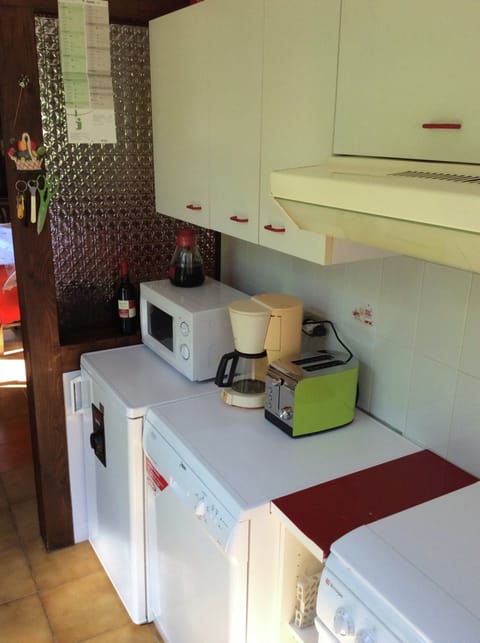 Villa | Private kitchen | Stovetop, coffee/tea maker