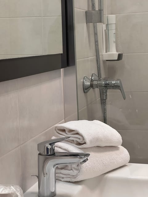 Desk, blackout drapes, soundproofing, iron/ironing board