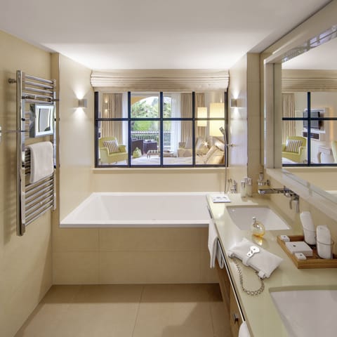 Rainfall showerhead, designer toiletries, hair dryer, bathrobes