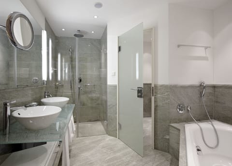 Suite | Bathroom | Hair dryer, bathrobes, slippers, towels