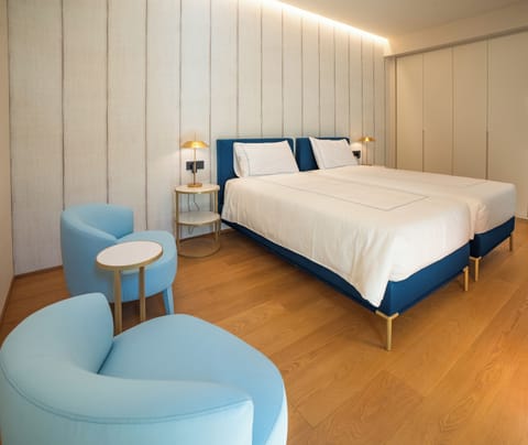 Suite, 2 Bedrooms (Master, Seaside) | Premium bedding, minibar, in-room safe, individually decorated