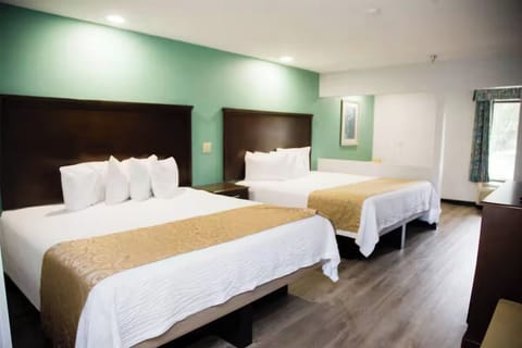Room, Smoking (2 King Beds with Sofa Bed) | In-room safe, iron/ironing board, free WiFi, bed sheets