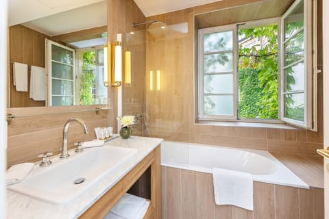 Superior Double Room | Bathroom | Separate tub and shower, rainfall showerhead, designer toiletries