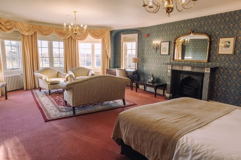 Exclusive Double Room (Main House) | Desk, iron/ironing board, free WiFi, bed sheets