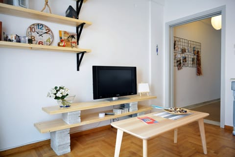 City Apartment | Living area | 40-inch flat-screen TV with digital channels, LCD TV