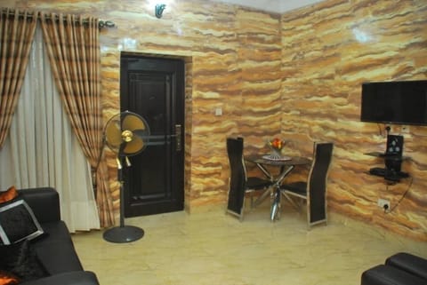 Deluxe Suite, 1 Bedroom, Kitchen | Living area | 42-inch LED TV with cable channels, TV, DVD player