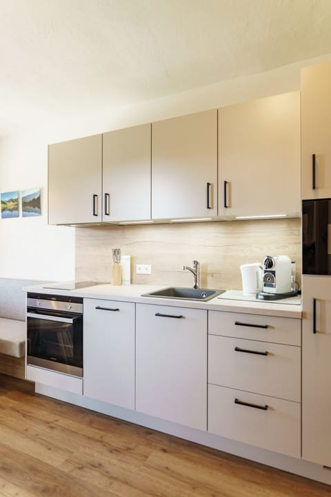 Comfort Condo, Balcony | Private kitchen | Full-size fridge, microwave, stovetop, dishwasher