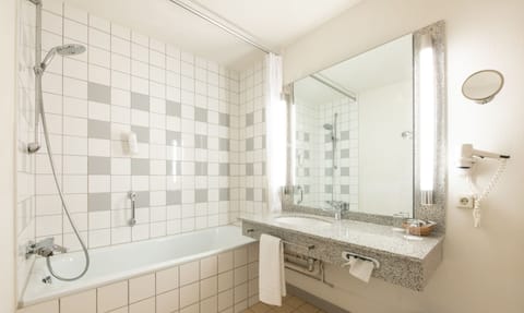 Shower, eco-friendly toiletries, hair dryer, towels