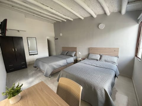 Triple Room | Individually furnished, blackout drapes, free WiFi, bed sheets