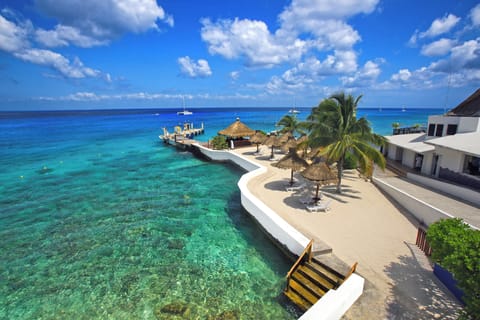 Private beach, beach shuttle, sun loungers, beach umbrellas