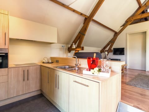 Apartment | Private kitchen | Toaster, highchair, cookware/dishes/utensils, dining tables