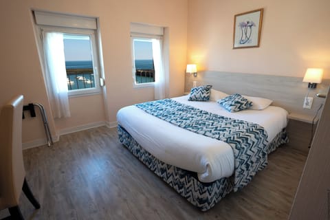 Standard Double Room, Ocean View | Desk, laptop workspace, iron/ironing board, free WiFi
