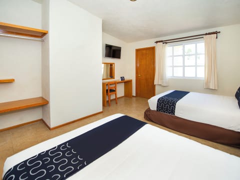 Premium bedding, desk, laptop workspace, iron/ironing board