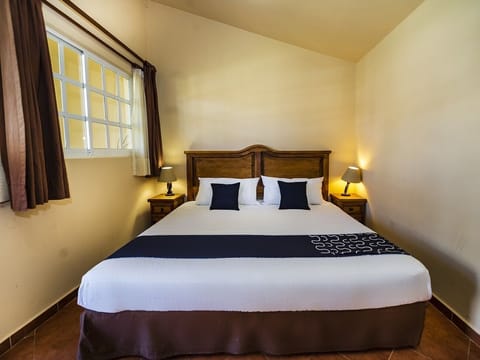 Premium bedding, desk, laptop workspace, iron/ironing board