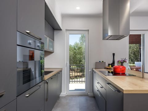 Villa | Private kitchen | Highchair