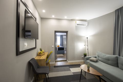 Superior Apartment | Living area | 32-inch LCD TV with cable channels, TV