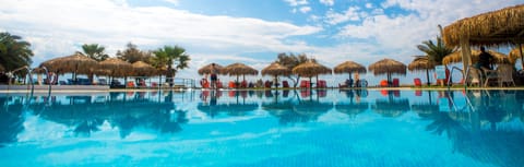 Outdoor pool, pool umbrellas, sun loungers