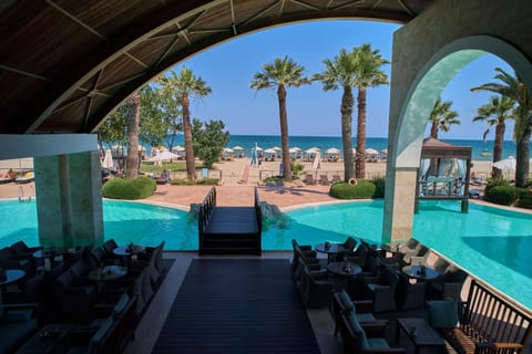 Indoor pool, seasonal outdoor pool, pool umbrellas, sun loungers