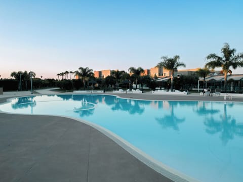Seasonal outdoor pool, pool umbrellas, sun loungers