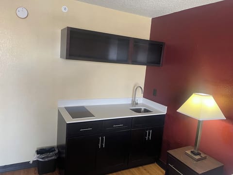 Desk, laptop workspace, blackout drapes, rollaway beds