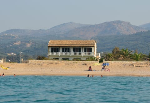 On the beach, sun loungers, beach umbrellas
