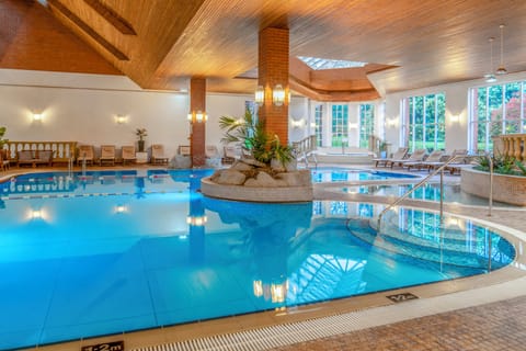 Indoor pool, open 7:00 AM to 7:00 PM, sun loungers