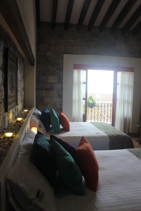 Master Suite Deluxe | Individually decorated, individually furnished, blackout drapes