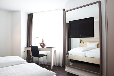 Classic Double Room | Minibar, in-room safe, desk, soundproofing