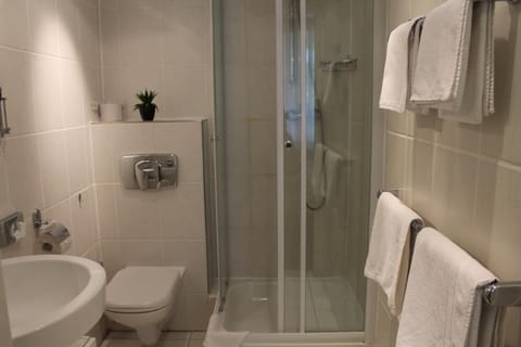 Shower, free toiletries, hair dryer, towels