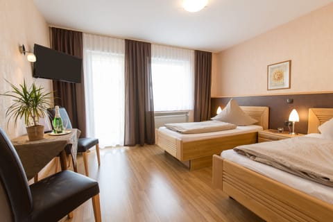 Hypo-allergenic bedding, in-room safe, desk, laptop workspace