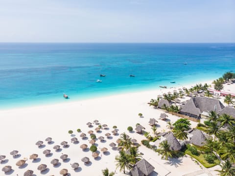On the beach, sun loungers, beach umbrellas, beach towels