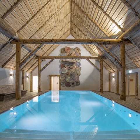 Indoor pool, open 7:00 AM to 10:00 PM, sun loungers