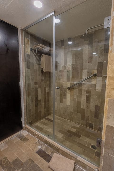 Shower, rainfall showerhead, designer toiletries, hair dryer