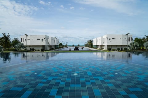 2 outdoor pools, open 7:00 AM to 7:00 PM, pool umbrellas