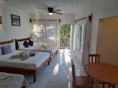 Family Room, Kitchenette | Free WiFi, bed sheets