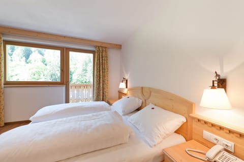 Down comforters, memory foam beds, desk, blackout drapes