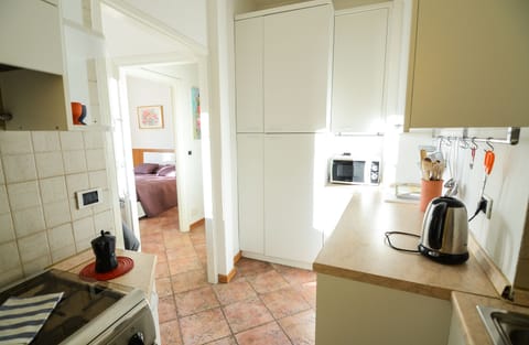 Apartment, Terrace (Historic City Centre-Salita Cavour 33) | Private kitchen | Full-size fridge, microwave, stovetop, coffee/tea maker