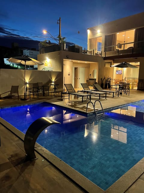 Outdoor pool, open 8:00 AM to 10:00 PM, sun loungers