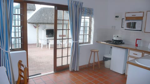 C Cottage | Living area | 36-inch flat-screen TV with satellite channels, TV