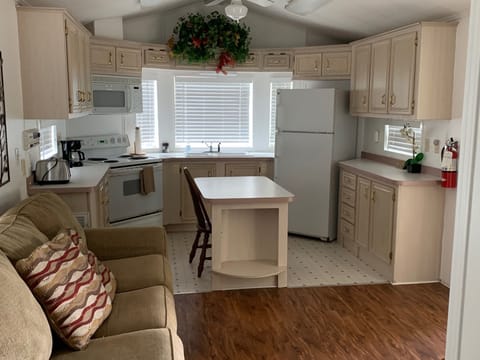 Chestnut Cottage | Private kitchen | Full-size fridge, microwave, coffee/tea maker, cookware/dishes/utensils