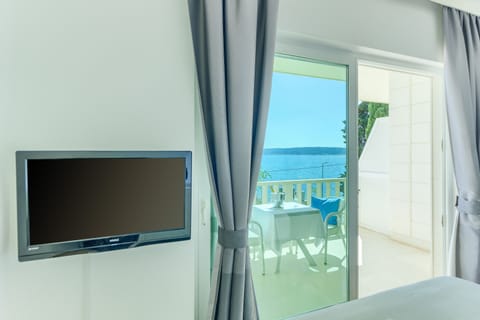 Deluxe Double or Twin Room, Terrace, Sea View | Minibar, in-room safe, desk, blackout drapes