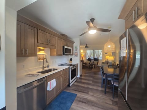 Comfort Condo, Garden View | Private kitchen | Fridge, microwave, coffee/tea maker, electric kettle