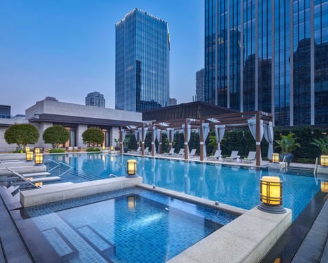 Outdoor pool, open 6:00 AM to 10:00 PM, pool umbrellas, sun loungers