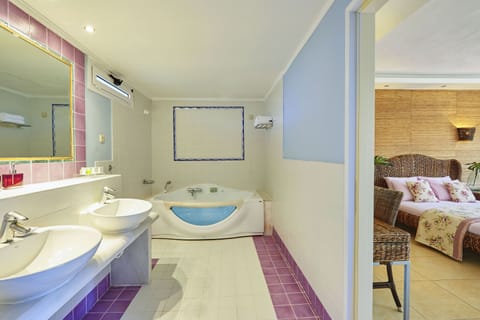 Honeymoon Suite, Sea View | Bathroom | Spring water tub, rainfall showerhead, free toiletries, hair dryer