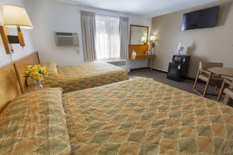 Standard Room, 2 Queen Beds | Individually decorated, individually furnished, desk, blackout drapes